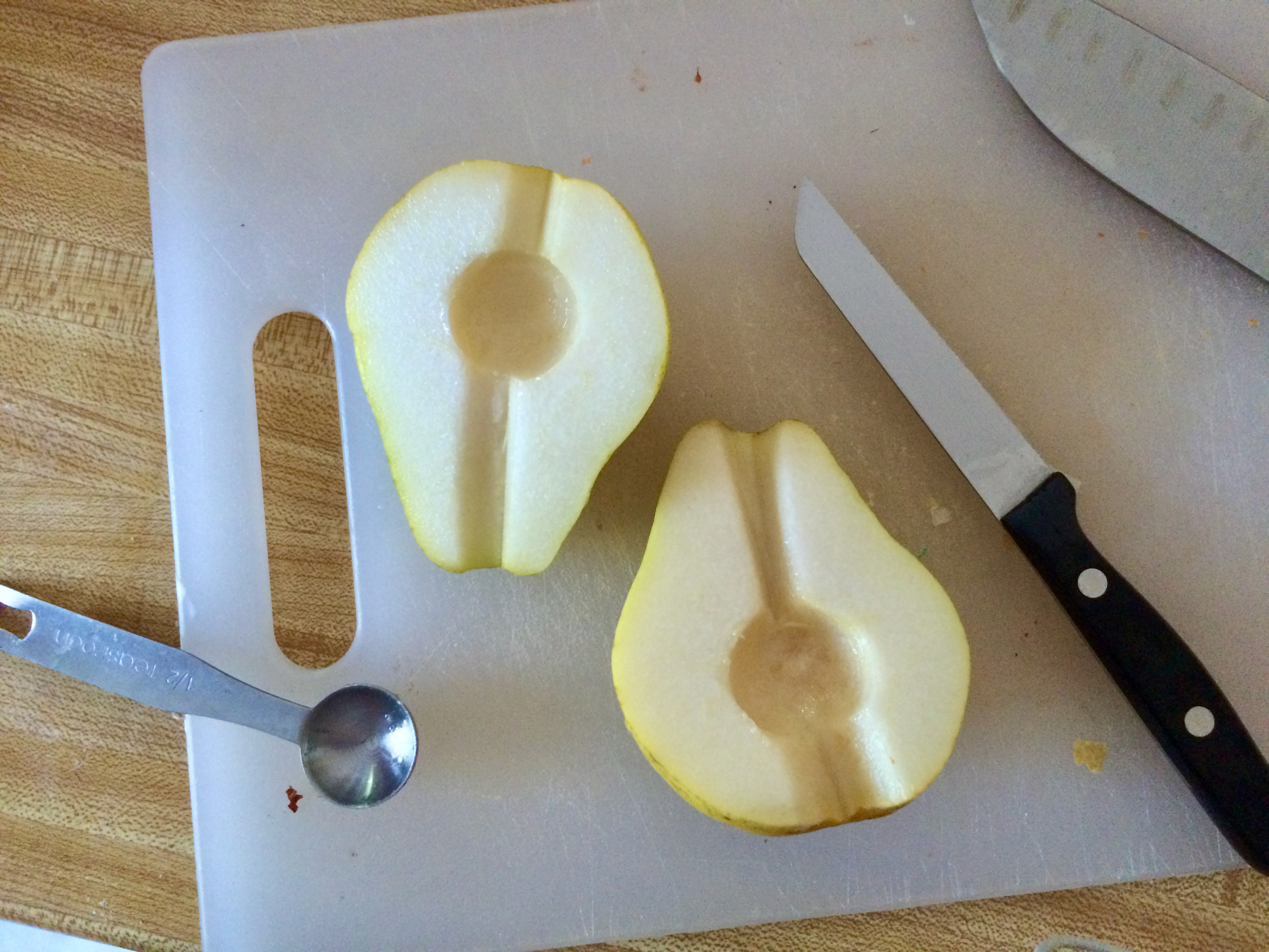 A pear cut in half.